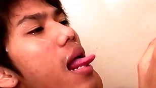 Cocksucking asian twinks shot at bareback twosome before pissing