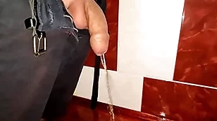 Closely-knit uncut cock pissing