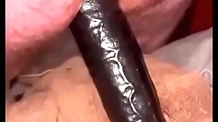 Massive black dildo making one's adieus my nuisance wide out in the open