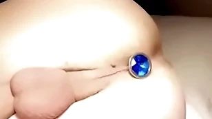 Twink with tight balls puts butt plug in tight hole
