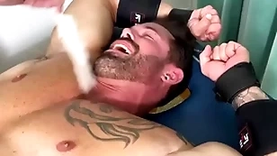 Muscular hunk endures bondage and bother greater than half naked diet