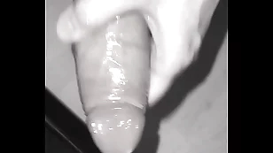 Jerking off a big dick roughly a condom